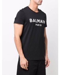 schwarzes und weißes bedrucktes T-Shirt mit einem Rundhalsausschnitt von Balmain