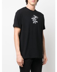 schwarzes und weißes bedrucktes T-Shirt mit einem Rundhalsausschnitt von Off-White