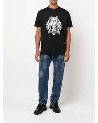 schwarzes und weißes bedrucktes T-Shirt mit einem Rundhalsausschnitt von Marcelo Burlon County of Milan