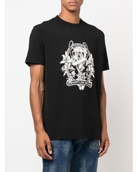 schwarzes und weißes bedrucktes T-Shirt mit einem Rundhalsausschnitt von Marcelo Burlon County of Milan