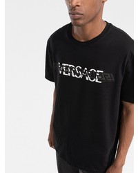 schwarzes und weißes bedrucktes T-Shirt mit einem Rundhalsausschnitt von Versace