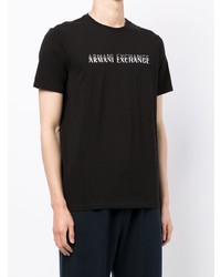 schwarzes und weißes bedrucktes T-Shirt mit einem Rundhalsausschnitt von Armani Exchange