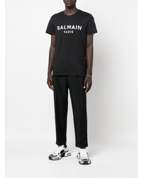 schwarzes und weißes bedrucktes T-Shirt mit einem Rundhalsausschnitt von Balmain