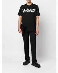 schwarzes und weißes bedrucktes T-Shirt mit einem Rundhalsausschnitt von Versace