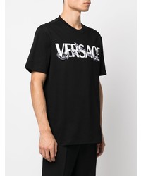 schwarzes und weißes bedrucktes T-Shirt mit einem Rundhalsausschnitt von Versace