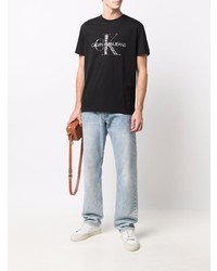 schwarzes und weißes bedrucktes T-Shirt mit einem Rundhalsausschnitt von Calvin Klein Jeans