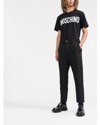 schwarzes und weißes bedrucktes T-Shirt mit einem Rundhalsausschnitt von Moschino