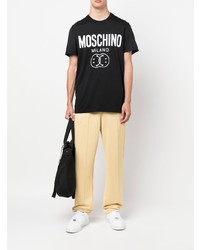 schwarzes und weißes bedrucktes T-Shirt mit einem Rundhalsausschnitt von Moschino