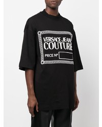 schwarzes und weißes bedrucktes T-Shirt mit einem Rundhalsausschnitt von VERSACE JEANS COUTURE