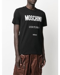 schwarzes und weißes bedrucktes T-Shirt mit einem Rundhalsausschnitt von Moschino