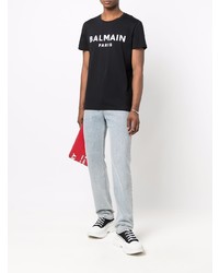 schwarzes und weißes bedrucktes T-Shirt mit einem Rundhalsausschnitt von Balmain