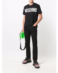 schwarzes und weißes bedrucktes T-Shirt mit einem Rundhalsausschnitt von Moschino