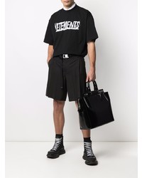 schwarzes und weißes bedrucktes T-Shirt mit einem Rundhalsausschnitt von Vetements