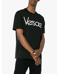 schwarzes und weißes bedrucktes T-Shirt mit einem Rundhalsausschnitt von Versace