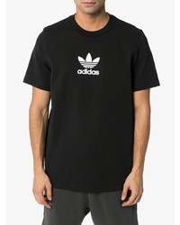 schwarzes und weißes bedrucktes T-Shirt mit einem Rundhalsausschnitt von adidas