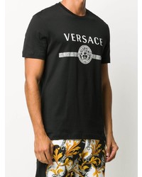 schwarzes und weißes bedrucktes T-Shirt mit einem Rundhalsausschnitt von Versace