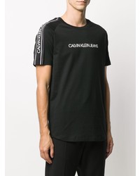 schwarzes und weißes bedrucktes T-Shirt mit einem Rundhalsausschnitt von Calvin Klein Jeans