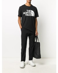 schwarzes und weißes bedrucktes T-Shirt mit einem Rundhalsausschnitt von The North Face