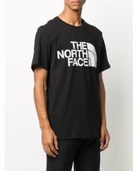 schwarzes und weißes bedrucktes T-Shirt mit einem Rundhalsausschnitt von The North Face