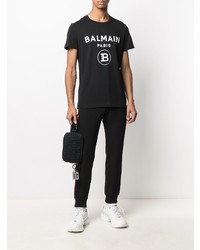 schwarzes und weißes bedrucktes T-Shirt mit einem Rundhalsausschnitt von Balmain