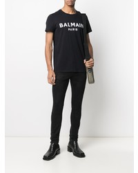 schwarzes und weißes bedrucktes T-Shirt mit einem Rundhalsausschnitt von Balmain