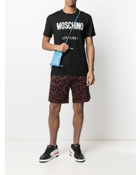 schwarzes und weißes bedrucktes T-Shirt mit einem Rundhalsausschnitt von Moschino