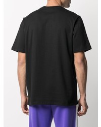 schwarzes und weißes bedrucktes T-Shirt mit einem Rundhalsausschnitt von MSGM