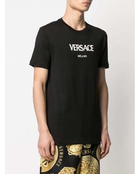 schwarzes und weißes bedrucktes T-Shirt mit einem Rundhalsausschnitt von Versace