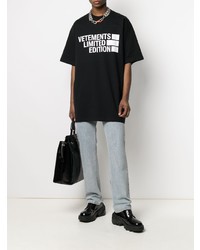 schwarzes und weißes bedrucktes T-Shirt mit einem Rundhalsausschnitt von Vetements