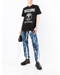 schwarzes und weißes bedrucktes T-Shirt mit einem Rundhalsausschnitt von Moschino