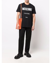 schwarzes und weißes bedrucktes T-Shirt mit einem Rundhalsausschnitt von Moschino