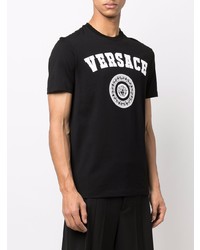 schwarzes und weißes bedrucktes T-Shirt mit einem Rundhalsausschnitt von Versace