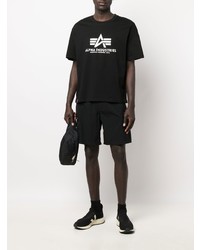 schwarzes und weißes bedrucktes T-Shirt mit einem Rundhalsausschnitt von Alpha Industries