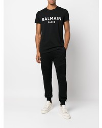 schwarzes und weißes bedrucktes T-Shirt mit einem Rundhalsausschnitt von Balmain