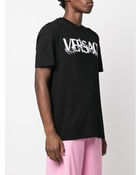 schwarzes und weißes bedrucktes T-Shirt mit einem Rundhalsausschnitt von Versace