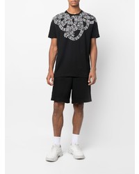 schwarzes und weißes bedrucktes T-Shirt mit einem Rundhalsausschnitt von Marcelo Burlon County of Milan