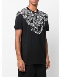 schwarzes und weißes bedrucktes T-Shirt mit einem Rundhalsausschnitt von Marcelo Burlon County of Milan