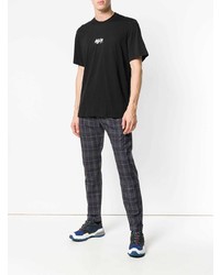 schwarzes und weißes bedrucktes T-Shirt mit einem Rundhalsausschnitt von MSGM