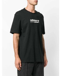 schwarzes und weißes bedrucktes T-Shirt mit einem Rundhalsausschnitt von adidas