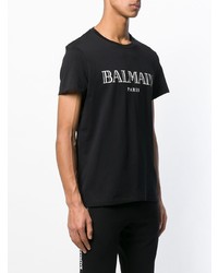 schwarzes und weißes bedrucktes T-Shirt mit einem Rundhalsausschnitt von Balmain