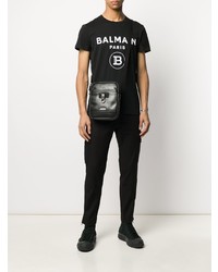 schwarzes und weißes bedrucktes T-Shirt mit einem Rundhalsausschnitt von Balmain