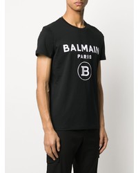 schwarzes und weißes bedrucktes T-Shirt mit einem Rundhalsausschnitt von Balmain