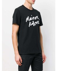 schwarzes und weißes bedrucktes T-Shirt mit einem Rundhalsausschnitt von MAISON KITSUNÉ