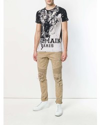 schwarzes und weißes bedrucktes T-Shirt mit einem Rundhalsausschnitt von Balmain