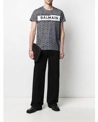 schwarzes und weißes bedrucktes T-Shirt mit einem Rundhalsausschnitt von Balmain