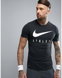 schwarzes und weißes bedrucktes T-Shirt mit einem Rundhalsausschnitt von Nike Training