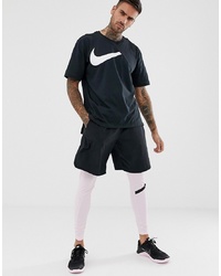 schwarzes und weißes bedrucktes T-Shirt mit einem Rundhalsausschnitt von Nike Training