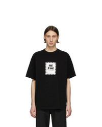 schwarzes und weißes bedrucktes T-Shirt mit einem Rundhalsausschnitt von Noon Goons