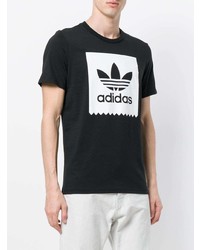 schwarzes und weißes bedrucktes T-Shirt mit einem Rundhalsausschnitt von adidas