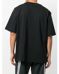 schwarzes und weißes bedrucktes T-Shirt mit einem Rundhalsausschnitt von adidas